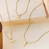 Therese Initial Halsband i Guld