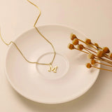 Therese Initial Halsband i Guld